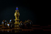 White chess King standing and fallen black chess pieces. Winner of business competition planning concept and marketing strategy. Macro Photograph by Sapiens Verbum