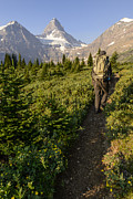 Woman hiking on trail in Canadian Rockies Photograph by Rebecca Schortinghuis