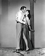 YVONNE DE CARLO and GEORGE BRENT in SLAVE GIRL -1947-, directed by CHARLES LAMONT. Photograph by Album