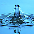 Water Drop Collisions #2 Photograph by Colin Rayner