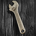 Adjustable Wrench over Black and White Wood 72 Photograph by YoPedro Adjustable Wrench over Black and White Wood 72 Photograph by YoPedro