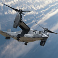 Bell Boeing Osprey V-22 helicopter close up view flying Photograph by Simon Bratt Bell Boeing Osprey V-22 helicopter close up view flying Photograph by Simon Bratt