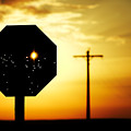 Bullet-riddled Stop Sign by Todd Klassy Bullet-riddled Stop Sign by Todd Klassy