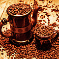 Ceramic Coffee Pot And Mug Overflowing With Beans by Jorgo Photography - Wall Art Gallery Ceramic Coffee Pot And Mug Overflowing With Beans by Jorgo Photography - Wall Art Gallery