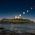 Eclipsing the Nubble Photograph by Scott Thorp Eclipsing the Nubble Photograph by Scott Thorp