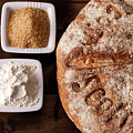 Fresh baked rustic bread Photograph by Simon Bratt Fresh baked rustic bread Photograph by Simon Bratt