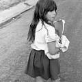 Girl Returns Home from School, 1971 Photograph by Jeremy Butler Girl Returns Home from School, 1971 Photograph by Jeremy Butler