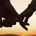 Holding hands in the sunset by Mariia Kalinichenko Holding hands in the sunset by Mariia Kalinichenko