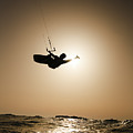 Kitesurfing at sunset Photograph by Hagai Nativ Kitesurfing at sunset Photograph by Hagai Nativ