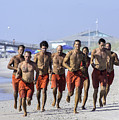 Kure Beach Life guards on the run Photograph by WAZgriffin Digital Kure Beach Life guards on the run Photograph by WAZgriffin Digital