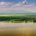 Mountain beyond the River Photograph by Daniel Murphy