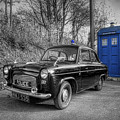 Old British Police Car And Tardis Photograph by Yhun Suarez Old British Police Car And Tardis Photograph by Yhun Suarez