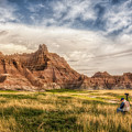 Photographer waiting for the Badlands Light Photograph by Rikk Flohr Photographer waiting for the Badlands Light Photograph by Rikk Flohr