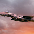 RAF Lakenheath F-15 Eagle in flight with orange sun light Photograph by Simon Bratt RAF Lakenheath F-15 Eagle in flight with orange sun light Photograph by Simon Bratt