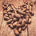Rustic country peanut heart. Natural foods Photograph by Jorgo Photography Rustic country peanut heart. Natural foods Photograph by Jorgo Photography