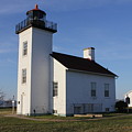 Sand Point lighthouse in Escanaba Photograph by Charles and Melisa Morrison Sand Point lighthouse in Escanaba Photograph by Charles and Melisa Morrison