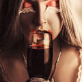 Vampire girl with holding glass of blood by Jorgo Photography