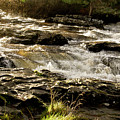 Sun over rushing falls. Dochart. Photograph by Elena Perelman Sun over rushing falls. Dochart. Photograph by Elena Perelman