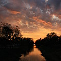 Sunrise on the Illinois Michigan Canal by Paula Guttilla