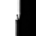 Two drawing pencils on a black and white surface. Photograph by Michalakis Ppalis Two drawing pencils on a black and white surface. Photograph by Michalakis Ppalis