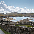 A Road Lined With A Stone Fence Along Photograph by John Short / Design Pics