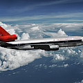 Among the Clouds - Northwest Orient DC-10-40 Mixed Media by Erik Simonsen Among the Clouds - Northwest Orient DC-10-40 Mixed Media by Erik Simonsen