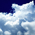 Billowing Masses of Cumulus Clouds Against a Dark Blue Sky Photograph by Linda Stern Billowing Masses of Cumulus Clouds Against a Dark Blue Sky Photograph by Linda Stern