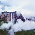 Clouds Cover Angel Falls In Canaima Np Venezuela Photograph by Dave Welling Clouds Cover Angel Falls In Canaima Np Venezuela Photograph by Dave Welling
