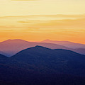 Mountain Light And Silhouette  Photograph by Jeff Sinon