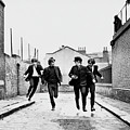The Beatles Running In Hard Days Night by Globe Photos