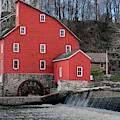 The red mill historical landmark. Photograph by Sam Rino The red mill historical landmark. Photograph by Sam Rino