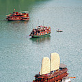 Tourist wooden Boats at Halong Bay Vietnam Photograph by Michalakis Ppalis Tourist wooden Boats at Halong Bay Vietnam Photograph by Michalakis Ppalis