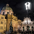 Historic Buildings Beneath The Tower Of Charles Bridge In The Night In Prague In The Czech Republic Photograph by Andreas Berthold Historic Buildings Beneath The Tower Of Charles Bridge In The Night In Prague In The Czech Republic Photograph by Andreas Berthold