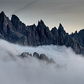 Mountain landscape with mist, at sunset Dolomites at Tre Cime Italy. Photograph by Michalakis Ppalis Mountain landscape with mist, at sunset Dolomites at Tre Cime Italy. Photograph by Michalakis Ppalis