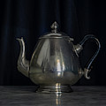 Silver and Brass Teapots Black Background Marble Table Photograph by Pablo Avanzini Silver and Brass Teapots Black Background Marble Table Photograph by Pablo Avanzini