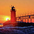 Sunset at the South Haven South Pier Light #1 by Michael Collins