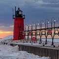 Winter Sunset at the South Haven South Pier Light #1 by Michael Collins