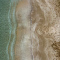 Aerial view drone of empty tropical sandy beach with golden sand. Seascape background Photograph by Michalakis Ppalis Aerial view drone of empty tropical sandy beach with golden sand. Seascape background Photograph by Michalakis Ppalis