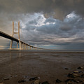 Vasco da Gama Bridge at sunset in Lisbon, Portugal Photograph by Michalakis Ppalis Vasco da Gama Bridge at sunset in Lisbon, Portugal Photograph by Michalakis Ppalis