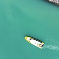 A boat heading out of harbour in Whitsundays, Australia Photograph by Andre Petrov A boat heading out of harbour in Whitsundays, Australia Photograph by Andre Petrov