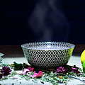 A drinking bowl with tea and herbs. Photograph by Bernhard Schaffer A drinking bowl with tea and herbs. Photograph by Bernhard Schaffer
