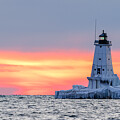 After Sunset at the Ludington North Pier Light by Michael Collins