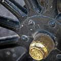 Antique Ford wheel Photograph by M Kathleen Warren Antique Ford wheel Photograph by M Kathleen Warren