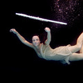 Artist magically floating with her flute 61 Photograph by Dan Friend Artist magically floating with her flute 61 Photograph by Dan Friend