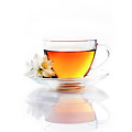Asian green tea with jasmine flower in transparent teacup isolat Photograph by Jelena Jovanovic Asian green tea with jasmine flower in transparent teacup isolat Photograph by Jelena Jovanovic