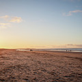 Brancaster Beach North Norfolk at sunset Photograph by Simon Bratt Brancaster Beach North Norfolk at sunset Photograph by Simon Bratt