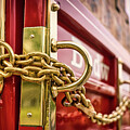 Budweiser Brass Chain On Wagon  by Rene Vasquez