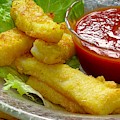 Calamari Steaks Cut Into Strips And Pan Fried by James Temple