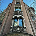 Casa de les Punxes Tall Ornate Brick Building with Intricate Carvings in Barcelona by Travel Essayist