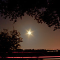 Charming Night Scene With A Star Shaped Moon Moonscape Moon Still Sunset Red Sky And Car Traces Photograph by Tatiana Bogracheva Charming Night Scene With A Star Shaped Moon Moonscape Moon Still Sunset Red Sky And Car Traces Photograph by Tatiana Bogracheva